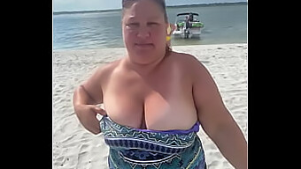 Busty Wife Duca Shows Off Her Assets On Public Beach