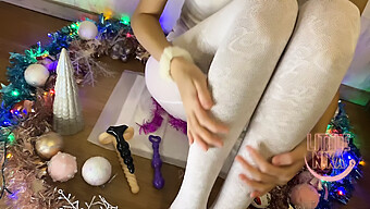 A Petite Teen Enjoys A Solo Session On Christmas