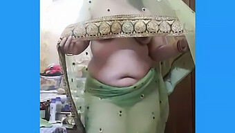 Seductive Indian Housewife Provocatively Wearing A Sheer Saree